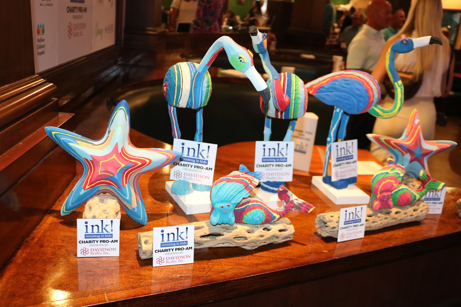 Sculptures made by Ocean Sole out of recycled flip-flops welcomed guests as they walked into the event.